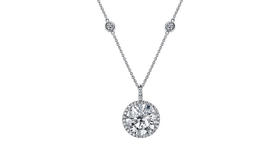 Silver diamond pendant necklace on a dainty chain with two station accent stones