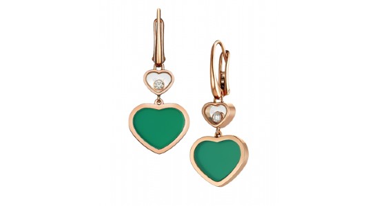 a pair of rose gold drop earrings featuring heart motifs and a vibrant green hue