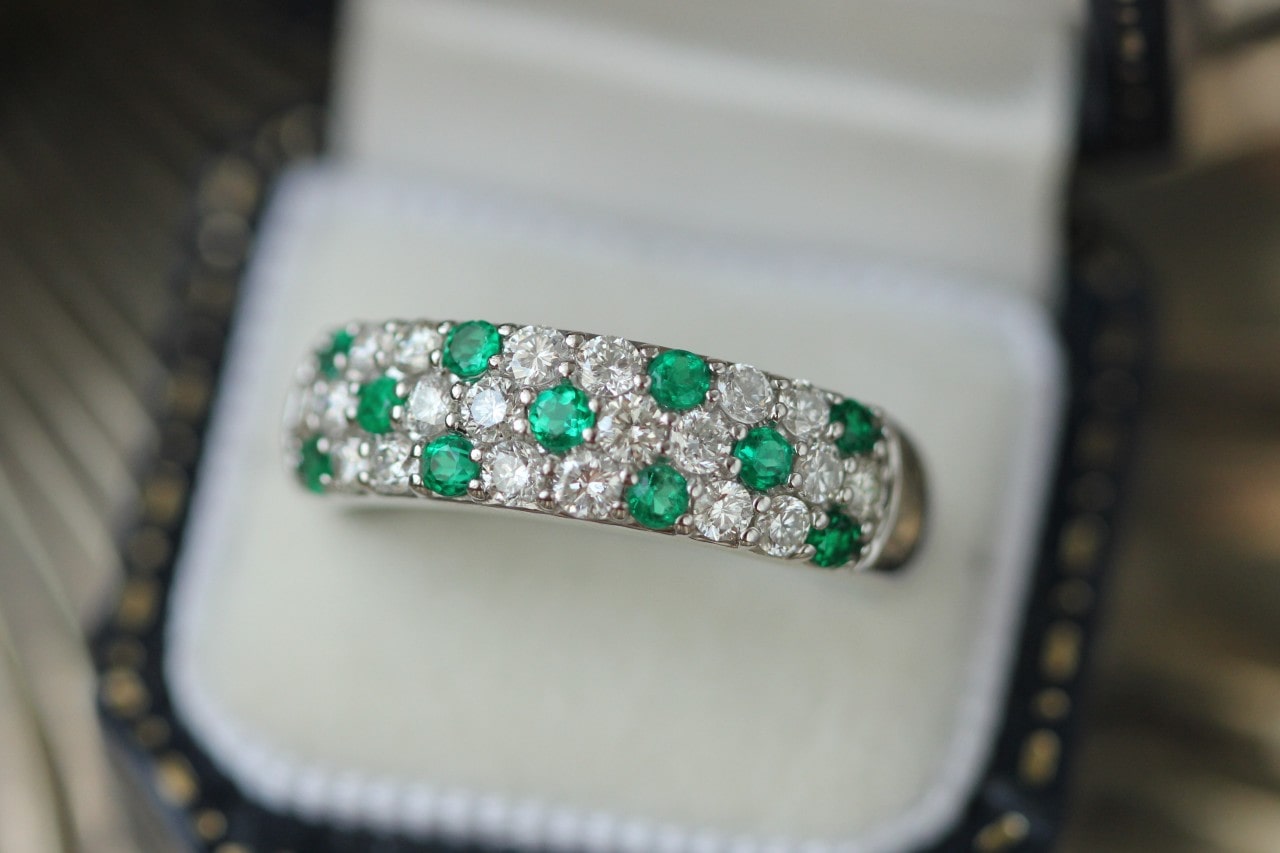 Emerald and diamond wedding band.