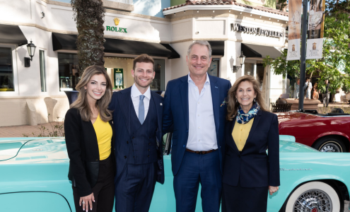 Owners Ed and Tracey Dikes and their two children, who also work within the business, standing in front of one of Weston Jewelers’ south Florida showrooms.