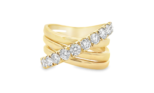 A distinctive yellow gold and diamond ring from the Weston Signature Collection, available at Weston Jewelers.
