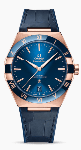 a rose gold watch with a navy blue dial and leather strap from Omega.