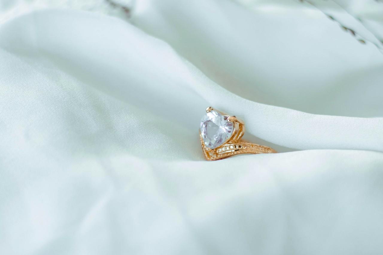 a unique engagement ring with a heart shaped center diamond a unique engagement ring with a heart shaped center diamond